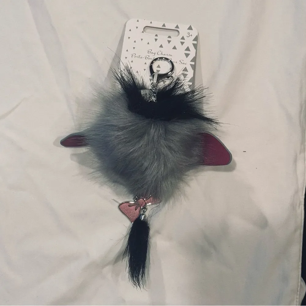 NWT Disney Eeyore Furry Pom Pom Bag Charm Keychain